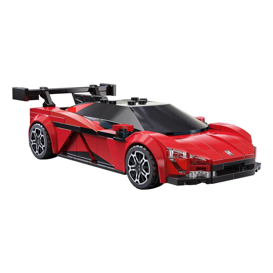 Red sports car model made of interlocking bricks on a white background