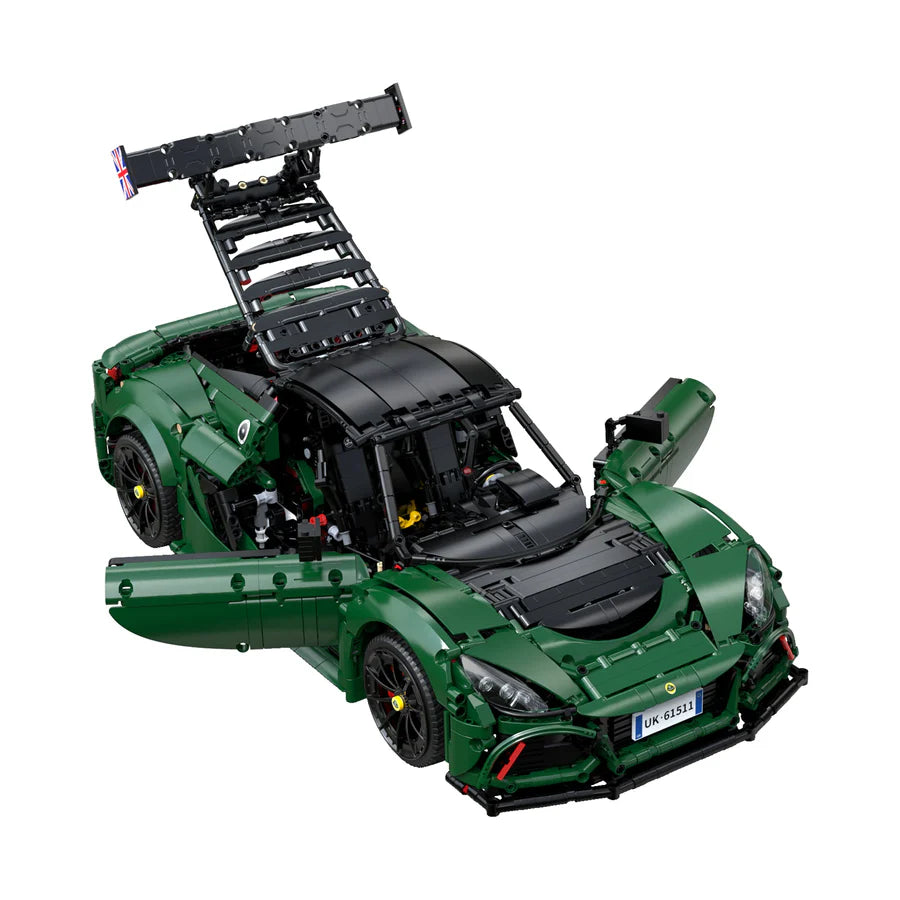 Green toy car model on a white background