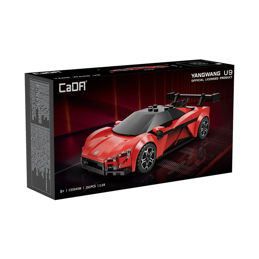 Boxed red sports car model with CaDA branding on a white background
