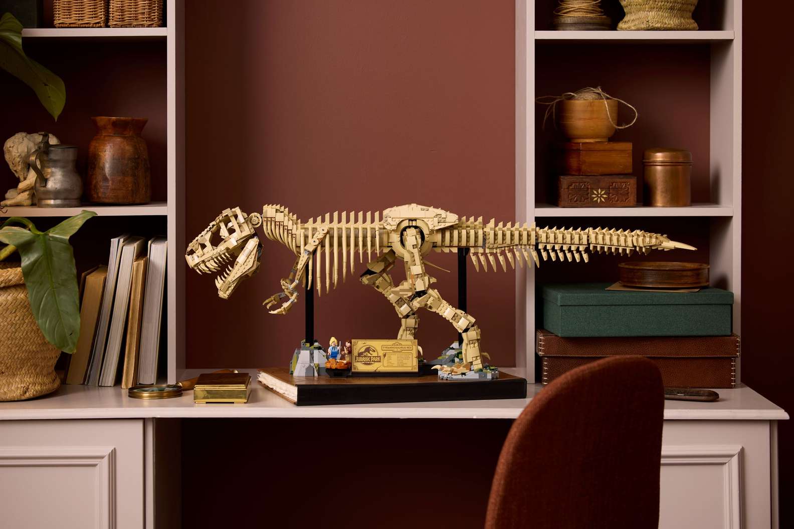 Impressive LEGO Jurassic Park T-Rex dinosaur fossil skeleton model, tan bricks on a black display stand. Bricking Lebanon